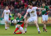 9 February 2014; David Drake, Mayo, in action against Conor Clarke, Tyrone. Allianz Football League, Division 1, Round 2, Tyrone v Mayo, Healy Park, Omagh, Co. Tyrone. Picture credit: Oliver McVeigh / SPORTSFILE