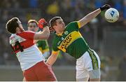 9 February 2014; Shane Enright, Kerry, in action against Emmett McGuckin, Derry. Allianz Football League Division 1 Round 2, Kerry v Derry, Fitzgerald Stadium, Killarney, Co. Kerry. Picture credit: Diarmuid Greene / SPORTSFILE