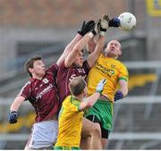 9 February 2014; Thomas Flynn and Paul Conroy, Galway, in action against Neil Gallagher, Donegal. Allianz Football League, Division 2, Round 2, Galway v Donegal, Pearse Stadium, Salthill, Galway. Picture credit: Ray Ryan / SPORTSFILE