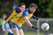 9 February 2014; Cathal Cregg, Roscommon, in action against Paidi Kelly, Wexford. Allianz Football League Division 3 Round 2, Roscommon v Wexford, Kiltoom, Co. Roscommon. Picture credit: David Maher / SPORTSFILE