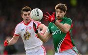 9 February 2014; Ger Cafferkey, Mayo, in action against Darren McCurry, Tyrone. Allianz Football League, Division 1, Round 2, Tyrone v Mayo, Healy Park, Omagh, Co. Tyrone. Picture credit: Oliver McVeigh / SPORTSFILE