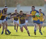 9 February 2014; Kevin Higgins, Roscommon, in action against Conor Carthy, Wexford. Allianz Football League Division 3 Round 2, Roscommon v Wexford, Kiltoom, Co. Roscommon. Picture credit: David Maher / SPORTSFILE