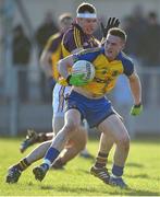 9 February 2014; Kevin Higgins, Roscommon, in action against Paddy Byrne, Wexford. Allianz Football League Division 3 Round 2, Roscommon v Wexford, Kiltoom, Co. Roscommon. Picture credit: David Maher / SPORTSFILE