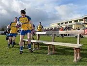 9 February 2014; Roscommon captain Niall Carty, leads the Roscommon team to the bench before the official  photograph. Allianz Football League Division 3 Round 2, Roscommon v Wexford, Kiltoom, Co. Roscommon. Picture credit: David Maher / SPORTSFILE
