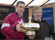 9 February 2014; Jockey Brian O'Connell holds up the Gold Cup with trainer Philip Fenton after winning The Hennessy Gold Cup on Last Instalment. Leopardstown Racecourse, Leopardstown, Co. Dublin. Picture credit: Barry Cregg / SPORTSFILE