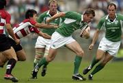 19 June 2005; Tommy Bowe, Ireland, supported by team-mates Eric Miller and Girvan Dempsey, is tackled by Hirotoki Onozawa, Japan. Japan v Ireland 2nd test, Prince Chichibu Memorial Rugby Ground, Tokyo, Japan. Picture credit; Brendan Moran / SPORTSFILE