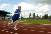 16 June 2005; Special Olympics athlete Nathan Tyrrell, Blue Dolphin, Wicklow town, starts the 400m run during the Special Olympics Ireland Leinster / Eastern Regional Games 2005. Morton Stadium, Santry, Dublin. Picture credit; Damien Eagers / SPORTSFILE