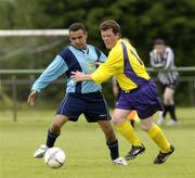 17 June 2005; Joe Alexander, Stillorgan Rangers, in action against Philip O'Reilly, Bray Lakers. Special Olympics Ireland Leinster / Eastern Regional Games 2005, Stillorgan Rangers  v Bray Lakers. AUL Complex, Clonshaugh, Dublin. Picture credit; David Maher / SPORTSFILE