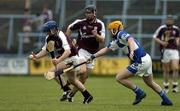 18 June 2005; Damien Hayes, Galway, in action against Joe Fitzpatrick, Laois. Guinness All-Ireland Senior Hurling Championship Qualifier, Round 1, Laois v Galway, O'Moore Park, Portlaoise, Co. Laois. Picture credit; Ray McManus / SPORTSFILE