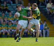 19 June 2005; Michael Crowley, Limerick, is tackled by Tomas O Se,  Kerry. Bank of Ireland Munster Senior Football Championship Semi-Final, Limerick v Kerry, Gaelic Grounds, Limerick. Picture credit; Ray McManus / SPORTSFILE