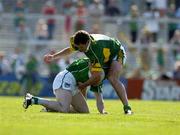 19 June 2005; Johnny Murphy, Limerick, is tackled by Eoin Brosnan, Kerry. Bank of Ireland Munster Senior Football Championship Semi-Final, Limerick v Kerry, Gaelic Grounds, Limerick. Picture credit; Ray McManus / SPORTSFILE
