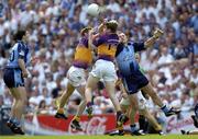 19 June 2005; Ciaran Whelan, right, and Colin Moran, Dublin, in action against Shane Cullen, (12) and Nicky Lambert, Wexford. Bank of Ireland Leinster Senior Football Championship Semi-Final, Dublin v Wexford, Croke Park, Dublin. Picture credit; Damien Eagers / SPORTSFILE