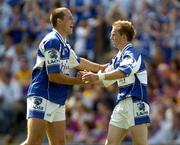 19 June 2005; Darren Rooney, right, Laois, shakes hands with team-mate Joe Higgins after victory over Kildare. Bank of Ireland Leinster Senior Football Championship Semi-Final, Laois v Kildare, Croke Park, Dublin. Picture credit; Damien Eagers / SPORTSFILE