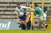 18 June 2005; Thomas Freeman, Monaghan, in action against James Rafter, London. Bank of Ireland All-Ireland Senior Football Championship Qualifier, Round 1, Monaghan v London, St. Tighernach's Park, Clones, Co. Monaghan. Picture credit; Pat Murphy / SPORTSFILE