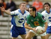 18 June 2005; James Rafter, London, in action against Thomas Freeman, Monaghan. Bank of Ireland All-Ireland Senior Football Championship Qualifier, Round 1, Monaghan v London, St. Tighernach's Park, Clones, Co. Monaghan. Picture credit; Pat Murphy / SPORTSFILE