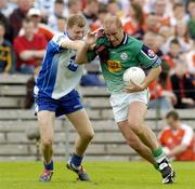 18 June 2005; Senan Hehir, London, in action against Eoin Lennon, Monaghan. Bank of Ireland All-Ireland Senior Football Championship Qualifier, Round 1, Monaghan v London, St. Tighernach's Park, Clones, Co. Monaghan. Picture credit; Pat Murphy / SPORTSFILE