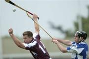 18 June 2005; Kevin Hayes, Galway, in action against Packie Cuddy, Laois. Guinness All-Ireland Senior Hurling Championship Qualifier, Round 1, Laois v Galway, O'Moore Park, Portlaoise, Co. Laois. Picture credit; Ray McManus / SPORTSFILE