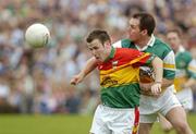 18 June 2005; Simon Rea, Carlow, in action against Scott Brady, Offaly. Bank of Ireland All-Ireland Senior Football Championship Qualifier, Round 1, Carlow v Offaly, Dr. Cullen Park, Co. Carlow. Picture credit; Damien Eagers / SPORTSFILE