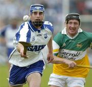 18 June 2005; Michael Walsh, Waterford, in action against Brian Whelahan, Offaly. Guinness All-Ireland Senior Hurling Championship Qualifier, Round 1, Offaly v Waterford, Dr. Cullen Park, Co. Carlow. Picture credit; Damien Eagers / SPORTSFILE