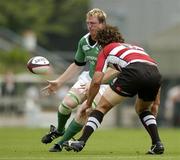 19 June 2005; Eric Miller, Ireland, offloads the ball before being tackled by Hare Makiri, Japan. Japan v Ireland 2nd test, Prince Chichibu Memorial Rugby Ground, Tokyo, Japan. Picture credit; Brendan Moran / SPORTSFILE