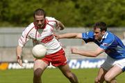 19 June 2005; Stephen O'Neill, Tyrone, in action against Mark McKeever, Cavan. Bank of Ireland Ulster Senior Football Championship Semi-Final, Tyrone v Cavan, St. Tighernach's Park, Clones, Co. Monaghan. Picture credit; Ciara Lyster / SPORTSFILE