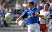 19 June 2005; Larry Reilly, Cavan, in action against Chris Lawn, Tyrone. Bank of Ireland Ulster Senior Football Championship Semi-Final, Tyrone v Cavan, St. Tighernach's Park, Clones, Co. Monaghan. Picture credit; Pat Murphy / SPORTSFILE