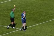 19 June 2005; Dublin's Coman Goggins is shown the yellow card by referee Brian Crowe. Bank of Ireland Leinster Senior Football Championship Semi-Final, Dublin v Wexford, Croke Park, Dublin. Picture credit; Brian Lawless / SPORTSFILE