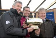 9 February 2014; Winning owner Michael O'Leary, jockey Brian O'Connell and trainer Philip Fenton hold up the Gold Cup after winning The Hennessy Gold Cup with Last Instalment. Leopardstown Racecourse, Leopardstown, Co. Dublin. Picture credit: Barry Cregg / SPORTSFILE
