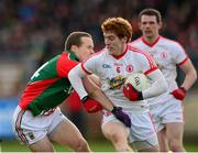 9 February 2014; Peter Harte, Tyrone, in action against Andy Moran, Mayo. Allianz Football League, Division 1, Round 2, Tyrone v Mayo, Healy Park, Omagh, Co. Tyrone. Picture credit: Oliver McVeigh / SPORTSFILE