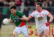 9 February 2014; Kevin McLoughlin, Mayo, in action against Aidan McCrory, Tyrone. Allianz Football League, Division 1, Round 2, Tyrone v Mayo, Healy Park, Omagh, Co. Tyrone. Picture credit: Oliver McVeigh / SPORTSFILE