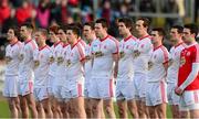 9 February 2014; The Tyrone team stand for a minute's silence. Allianz Football League, Division 1, Round 2, Tyrone v Mayo, Healy Park, Omagh, Co. Tyrone. Picture credit: Oliver McVeigh / SPORTSFILE