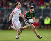 9 February 2014; Kevin McLoughlin, Mayo, in action against  Colm Cavanagh, Tyrone. Allianz Football League Division 1 Round 2, Tyrone v Mayo, Healy Park, Omagh, Co. Tyrone. Picture credit: Oliver McVeigh / SPORTSFILE