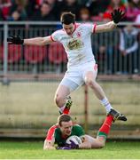 9 February 2014; Andy Moran, Mayo, in action against Conor Clarke, Tyrone. Allianz Football League Division 1 Round 2, Tyrone v Mayo, Healy Park, Omagh, Co. Tyrone. Picture credit: Oliver McVeigh / SPORTSFILE