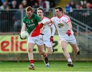 9 February 2014; Adan Gallagher, Mayo, in action against Aidan McCrory, Tyrone. Allianz Football League Division 1 Round 2, Tyrone v Mayo, Healy Park, Omagh, Co. Tyrone. Picture credit: Oliver McVeigh / SPORTSFILE
