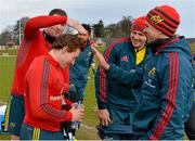 11 February 2014; Munster's Cathal Sheridan is greeted by team-mates Donnacha Ryan, left, James Coughlan and head of physiotheraphy Anthony Coole, right, as he arrives for squad training ahead of their Celtic League 2013/14, Round 14, game against Zebre on Saturday. Munster Rugby Squad Training, University of Limerick, Limerick. Picture credit: Diarmuid Greene / SPORTSFILE