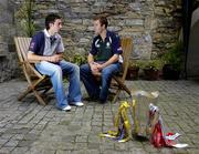 21 June 2005; Tipperary's Benny Dunne in conversation with Ben O'Connor, Cork, right, during a photocall ahead of this weekend's Guinness Munster Senior Hurling Championship Final. Ely Place, Dublin. Picture credit; Ray McManus / SPORTSFILE