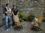21 June 2005; Tipperary's Benny Dunne and Ben O'Connor, Cork, right, during a photocall ahead of this weekend's Guinness Munster Senior Hurling Championship Final. Ely Place, Dublin. Picture credit; Ray McManus / SPORTSFILE
