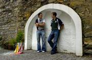 21 June 2005; Tipperary's Benny Dunne and Ben O'Connor, Cork, right, during a photocall ahead of this weekend's Guinness Munster Senior Hurling Championship Final. Ely Place, Dublin. Picture credit; Pat Murphy / SPORTSFILE