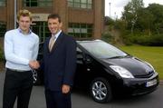 21 June 2005; Steve Tormey, Sales and Marketing Director, Toyota Ireland presents a Toyota Prius to athlete David Gillick in recognition of his Gold Medal in the 400m at the 2005 European Indoor Championships. David is currently preparing for the World Championships in Helsinki. Toyota Ireland, Killeen Road, Dublin. Picture credit; Damien Eagers / SPORTSFILE