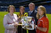 22 June 2005; The Foras na Gaeilge Senior Camogie Championship was launched in Croke Park today by Miriam O'Callaghan, left, Uachtaran Cumann Camogaiochta na nGael and Joe McDonagh, Chief Executive, Foras na Gaeilge. With them are Imelda Kennedy, Kilkenny and Elaine Burke, Cork. Croke Park, Dublin. Picture credit; Ray McManus / SPORTSFILE