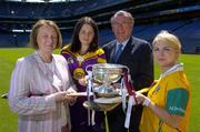 22 June 2005; The Foras na Gaeilge Senior Camogie Championship was launched in Croke Park today by Miriam O'Callaghan, left, Uachtaran Cumann Camogaiochta na nGael and Joe McDonagh, Chief Executive, Foras na Gaeilge. With them at the launch are Carla Doherty, Antrim and  Mary Leacy, Wexford. Croke Park, Dublin. Picture credit; Ray McManus / SPORTSFILE