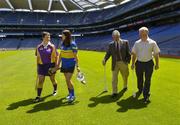 22 June 2005; The Foras na Gaeilge Senior Camogie Championship was launched in Croke Park, at the launch are former hurling stars Len Gaynor, Tipperary, and Mick  Jacob, right, Wexford, with their daughters Ursula (Jacob), left, and Ciara (Gaynor). Croke Park, Dublin. Picture credit; Ray McManus / SPORTSFILE