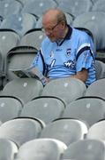19 June 2005; A Dublin fan reads his programme before the start of the match. Bank of Ireland Leinster Senior Football Championship Semi-Final, Laois v Kildare, Croke Park, Dublin. Picture credit; Brian Lawless / SPORTSFILE