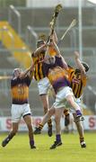 22 June 2005; Michael Fennelly, Kilkenny, wins possession from his team-mate Stephen Maher and Wexford players Colin Breen, left, and Richie Kehoe. U21 Leinster Hurling Championship Semi-Final, Wexford v Kilkenny, Wexford Park, Wexford. Picture credit; Matt Browne / SPORTSFILE