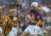 22 June 2005; Jim Barry, Wexford, in action against Richie Power, Kilkenny. U21 Leinster Hurling Championship Semi-Final, Wexford v Kilkenny, Wexford Park, Wexford. Picture credit; Matt Browne / SPORTSFILE