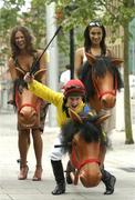 23 June 2005; Top Jockey Cathy Gannon with models Gail Kaneswaran, right, and Roberta Rowat at a photocall ahead of the Budweiser Irish Derby which will take place at the Curragh Racecourse on Sunday, June 26th. Grafton Street, Dublin. Picture credit; Damien Eagers / SPORTSFILE