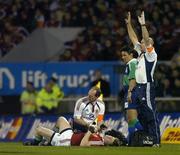 25 June 2005; A member of the medial staff signals for a stretcher as British and Irish Lions captain Brian O'Driscoll is attended to by team doctor Dr. James Robson. O'Driscoll is suspected to have a dislocated shoulder. British and Irish Lions Tour to New Zealand 2005, 1st Test, New Zealand v British and Irish Lions, Jade Stadium, Christchurch, New Zealand. Picture credit; Brendan Moran / SPORTSFILE