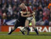 25 June 2005; Neil Back, British and Irish Lions, loses possession after being tackled by Richie McCaw, New Zealand. British and Irish Lions Tour to New Zealand 2005, 1st Test, New Zealand v British and Irish Lions, Jade Stadium, Christchurch, New Zealand. Picture credit; Brendan Moran / SPORTSFILE