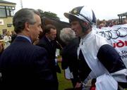 25 June 2005; Jockey Kevin Manning speaks to Trainer Jim Bolger after Alexander Goldrun had won the Audi Pretty Polly Stakes. Curragh Racecourse, Co. Kildare. Picture credit; Damien Eagers / SPORTSFILE