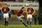 25 June 2005; Jonny Wilkinson, British and Irish Lions, kicks a penalty attempt, watched by team-mates Julian White, left, and Dwayne Peel. British and Irish Lions Tour to New Zealand 2005, 1st Test, New Zealand v British and Irish Lions, Jade Stadium, Christchurch, New Zealand. Picture credit; Brendan Moran / SPORTSFILE